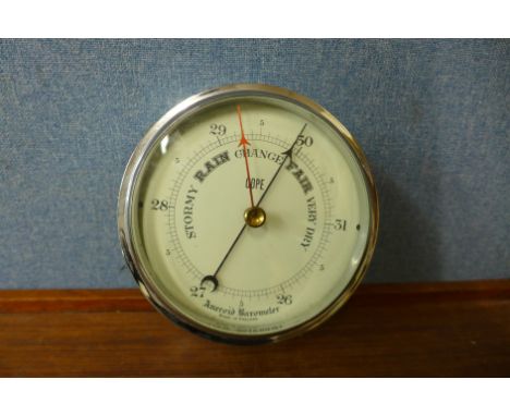 A Cope chrome ships style aneroid barometer 