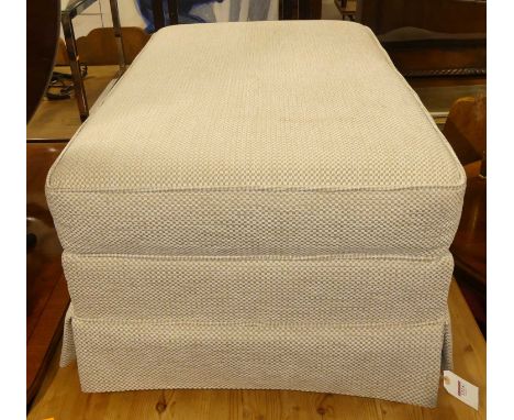 A contemporary Glasswells pale fabric upholstered footstool, raised on roller castors, length 100cm, together with a lime gre
