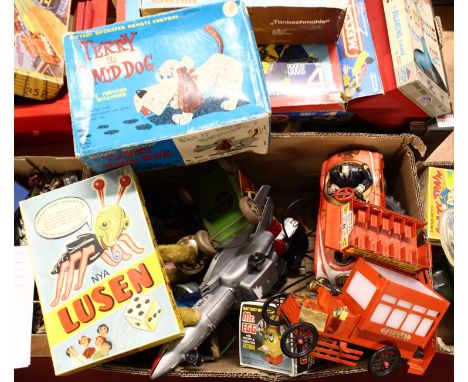 A box containing mostly tinplate models to include a Modern Toys of Japan tractor, a battery operated remote control boxed Te