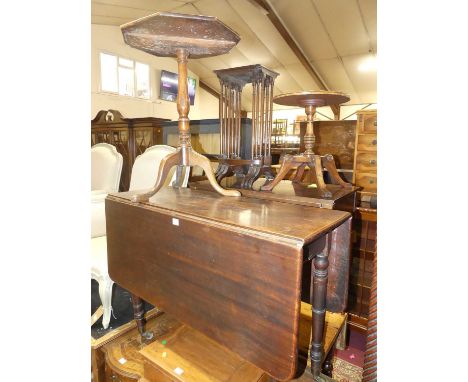An early 19th century mahogany round cornered drop leaf dining table, on ring turned supports, length 117cm, together with an