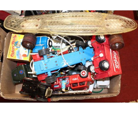 A box containing mostly various tinplate models to include a Joustra battery operated F1 car, a friction drive MF718 fire eng