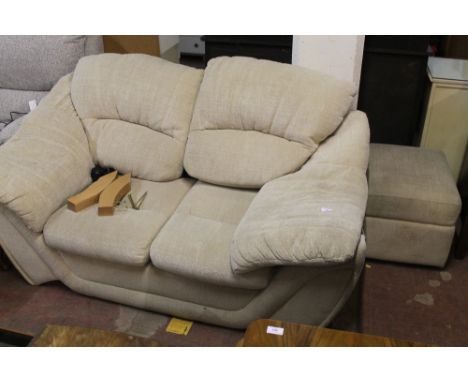 A MODERN TWO SEATER SOFA