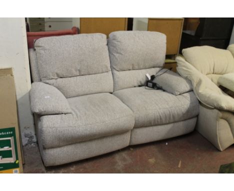 A MODERN OATMEAL TWO SEATER RECLINING SOFA 