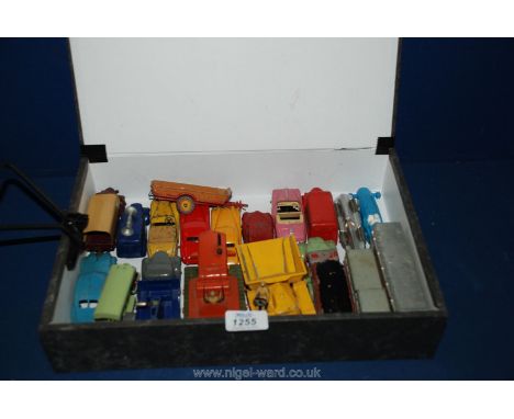 A box of Dinky Toys including Muir Hill Dumper, Heavy Tractor, etc. (approx. 19)