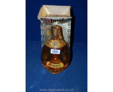 A bottle of  'John Haig' Dimple Scotch Whisky, boxed