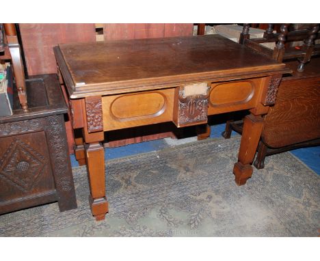 A late 19th c. Oak Altar Table, having rectangular top on moulded surround in turn on carved corbel supports, the central car