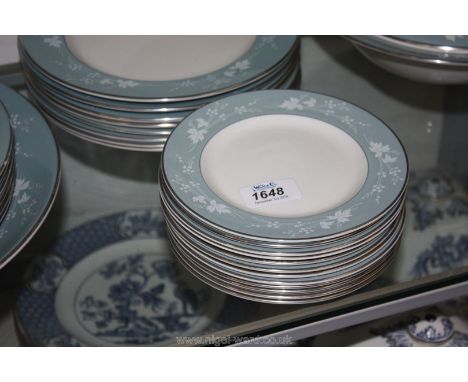 A Royal Doulton 'Reflection' Dinner service including six dinner and dessert plates, eight salad plates and cereal bowls, twe