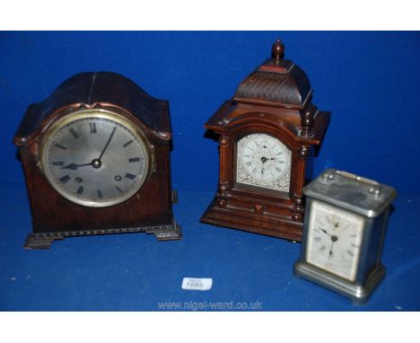 An Ansonia Carriage Clock, a/f, 1920's Oak Mantle Clock stamped Empire, no keys, and one other.