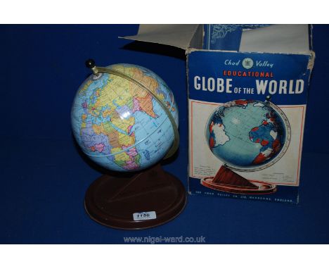 A boxed 1960's Chad Valley tin Globe.