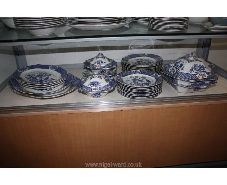 A large quantity of blue and white Dinner service with exotic bird decoration, including dinner plates, dessert plates, gradu