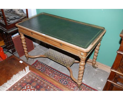 A superb 19th c. Satinwood Writing Table, having pierced brass gallery with quatrefoil motif surrounding the inset tooled lea