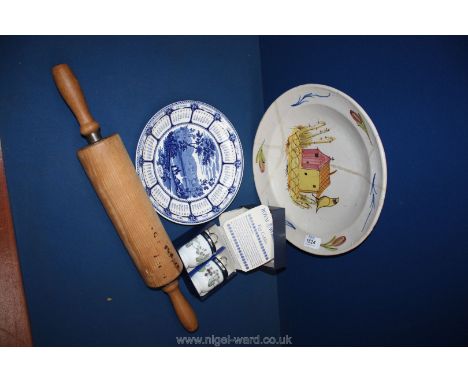 A quantity of china including Worcester egg coddlers, Wedgwood year plate and a wooden rolling pin, etc.