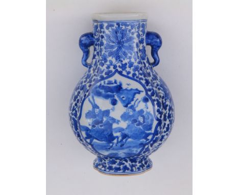 A 19thC Chinese blue &amp; white porcelain vase of Hu form, the cartouche panels painted with scholars to one side and warrio