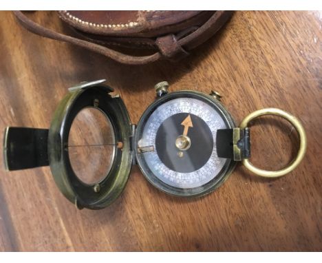 A WWI  compass in case.