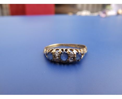 A Victorian sapphire &amp; diamond set 18ct gold ring.. Finger size S/T.