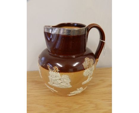 A Doulton Lambeth hunting jug with silver rim, 6.5” high.