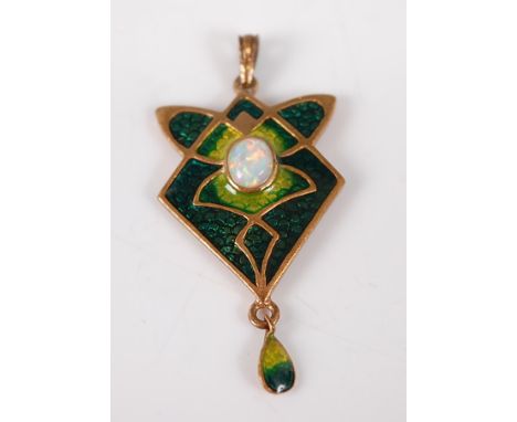 A yellow metal Arts & Crafts opal and enamel pendant, in the style of Murrle Bennett, comprising a centre opal cabochon measu