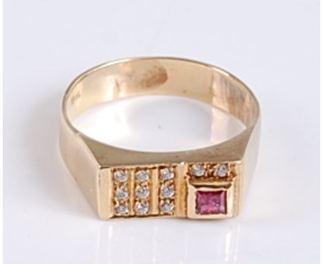 A yellow metal, ruby and diamond rectangular signet ring, featuring a square cut ruby and eleven round brilliant cut diamonds