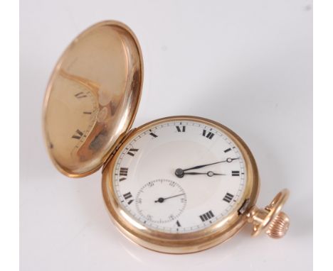 A gent's 9ct gold cased full hunter pocket watch, the plain case with gold inner back cover, the white enamel dial (hairline)