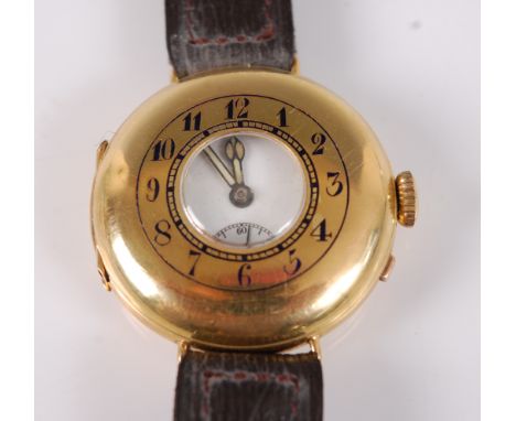 A George V gent's 18ct gold cased half hunter wristwatch, the hinged cover set with Arabic numerals in blue enamel, the white