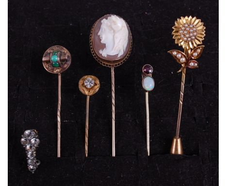 A Victorian seed pearl and yellow metal flower head stick-pin, 6cm; together with a ruby and opal example, a turquoise set ex