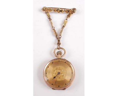 A 9ct yellow gold lady's open face pocket watch, with gilt dial having leaf detail, case dia. 29mm, keyless movement currentl