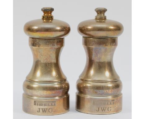 A silver salt and pepper grinder set, London 2000, Millennium hallmarks, engraved Pirelli and JWG, 10.5cm