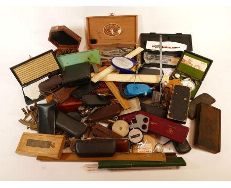 A collection of measuring and marking tools and instruments, to include micrometers, slide rules and marking gauges. (1 box)