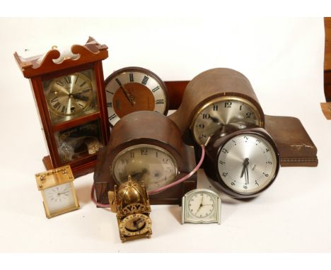 A collection of mid twentieth-century and later mantel clocks, wall clocks and barometers, to include, a 1960s Smiths carriag