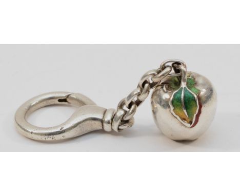 Tiffany & Co, a 925 Italian silver Tiffany & Co Apple shaped key ring, with enamel leaf detail, 30gm. It is showing wear and 