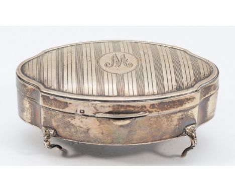 An oval silver trinket box, Birmingham 1921, with velvet liner, raised on four feet, 10.5 x 6cm