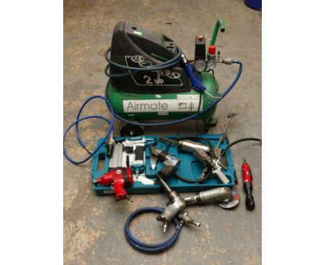 An Airmate 240V compressor, together with a box of air tools and related items.