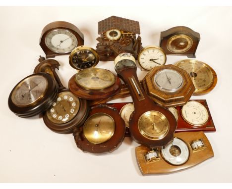 A collection of mid twentieth-century and later mantel clocks, wall clocks and barometers, to include, an Oris seven jewels a
