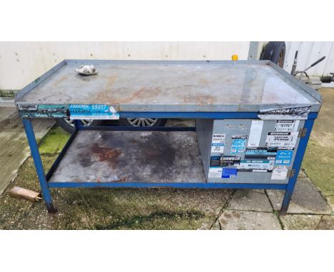 A substantial steel workbench/station, the rectangular top with lower shelf and lockable storage cupboard, W181, H95, D93cm.