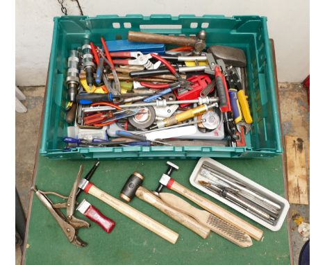 A collection of quality tools, including Syke pick aunt panel beating hammers with Wiss tin snips.