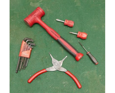 A collection of Snap On tools including an allen key set, three screwdrivers, a plastic mallet and circlip plyers.