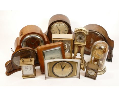 A collection of mid twentieth-century and later mantel clocks, wall clocks and barometers, to include, an Avia carriage clock