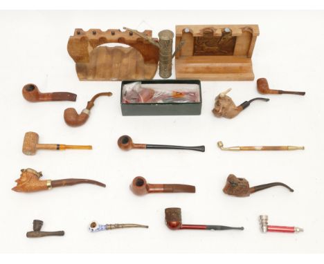 Sixteen pipes, to include, a carved briar pipe depicting a bull, a French 'Colette' briar pipe, and a K &amp; P, Peterson of 
