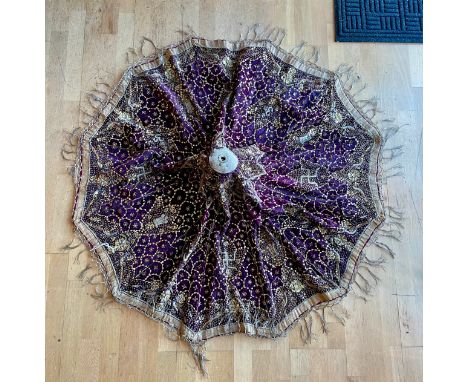 A late 19th century Indian, purple brocade, circular parasol cover, embroidered with auspicious symbols, sequins and stitchin