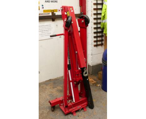 A Clarke strong arm engine hoist with hydraulic action. (Hand pumped with max load of 1000KG.)