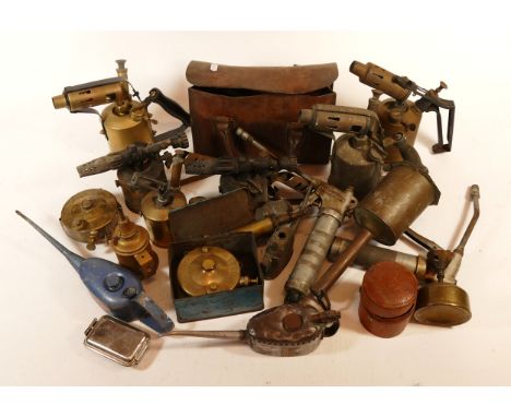 A collection of tools to include oil cans, blow torches, grease guns and cobblers tools. (1 box)