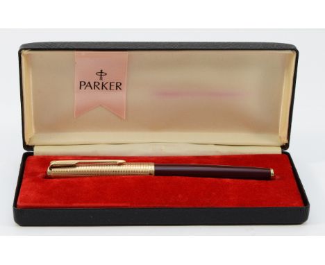 Sheaffer, a black resin squeeze action fountain pen with 14K gold nib, case