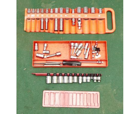 A collection of Snap On sockets on a magnetic tray (3/8 inch drive metric sizes), sockets on plastic sorter (3/8 inch metric)