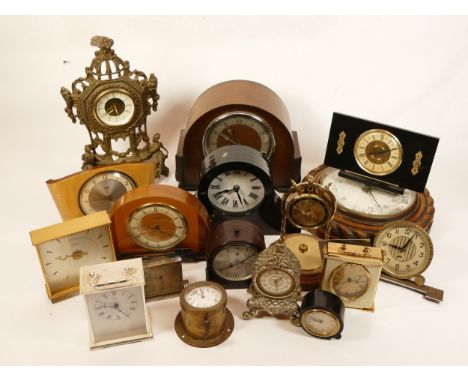 A collection of mid twentieth-century and later mantel clocks, wall clocks and barometers, to include, a Cyma travel clock, a