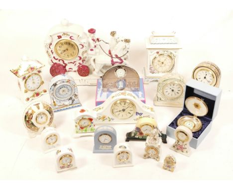A selection of ceramic mantel clocks, bedside clocks and miniature novelty clocks, makers to include Wedgwood, Aynsley and Ro