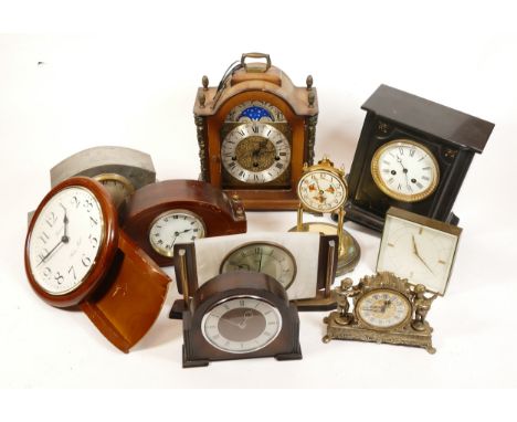 A collection of mid twentieth-century and later mantel clocks, wall clocks and barometers, to include, a Hermle mantel clock 