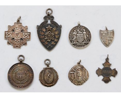 A Victorian silver and gold applied medal, B.W.C.C. 1887 Road Race, First, and seven other medals/fobs, 80gm