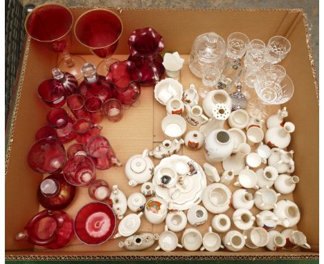 A collection of crested goss ware, a collection of cranberry glass to include glasses, vases and tumblers, also cut glass war