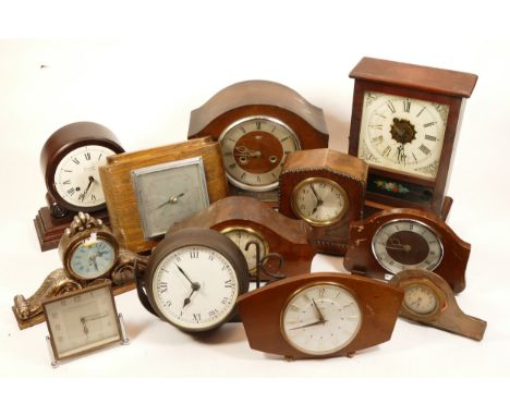 A collection of mid twentieth-century and later mantel clocks, wall clocks and barometers, to include, a Smiths brass mantel 