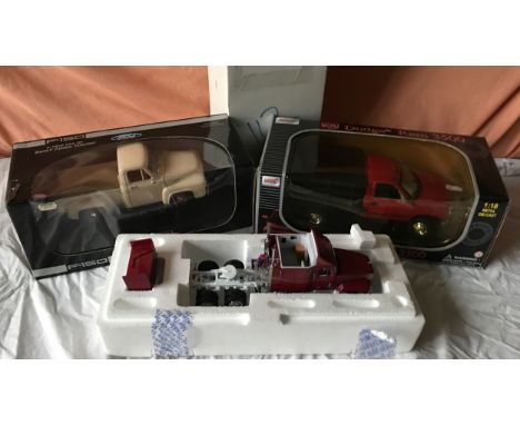 Diecast model vehicles. Franklin Mint 1993 Mack Truck, Anso Dodge Ram 3500 1:18 scale and a Chinese made Ford F-150 2004, min